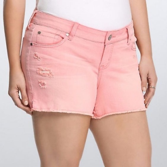 pink distressed shorts